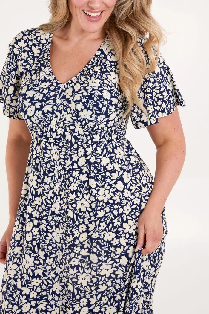 BUTTON FRONT FLORAL DRESS IN NAVY